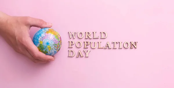 World Population Day Write Wooden Letter Globe Woman Hand — Stock Photo, Image