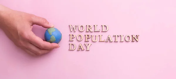 World Population Day Write Wooden Letter Globe Woman Hand — Stock Photo, Image