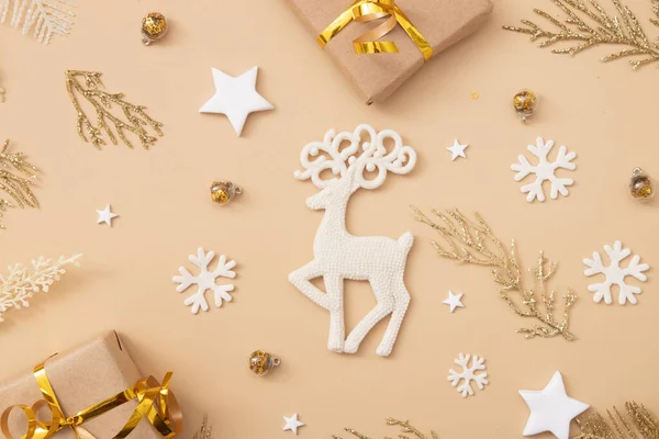 Deer Christmas Decoration Pastel Beige Background Holiday Present Concept Top — Foto Stock
