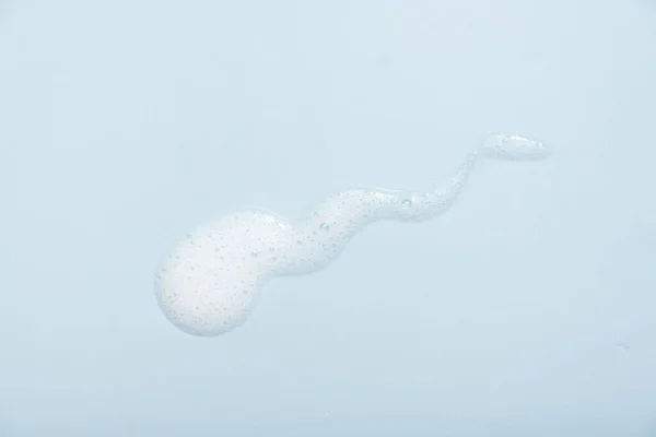 Face Cleansing Mousse Sample White Cleanser Foam Bubbles Blue Background — Stock Photo, Image