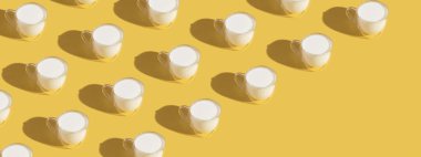 Banner with milk in a glass pattern on a colored background, dairy diet concept . High quality photo
