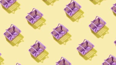 Moving shopping carts on colored background, animated video sales concept. High quality 4k footage
