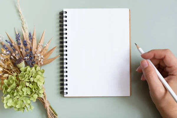 stock image Blank sheet paper notebook on colored background top view. Flat lay.