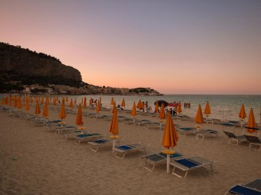 The beach of Mondello at sunset clipart