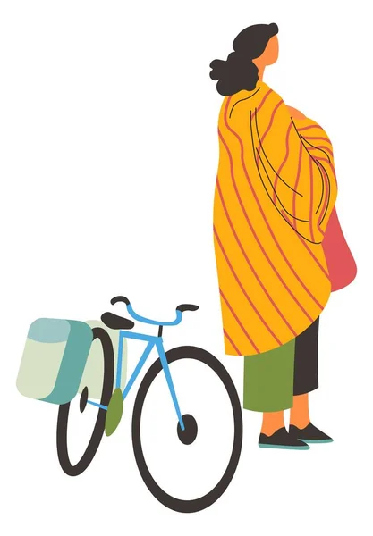 Mujer cubierta de manta de pie por vector de bicicleta — Archivo Imágenes Vectoriales