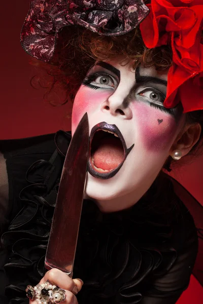 Woman mime with knife — Stock Photo, Image