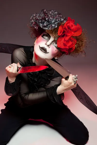 Woman mime with knife — Stock Photo, Image