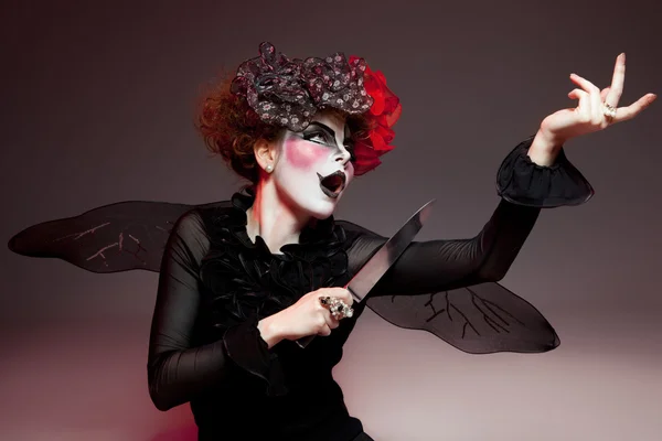 Woman mime with knife — Stock Photo, Image