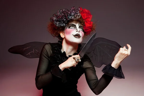 Woman mime with knife — Stock Photo, Image