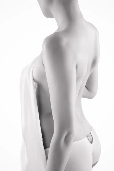 Jeune femme nue avec serviette sur blanc — Photo