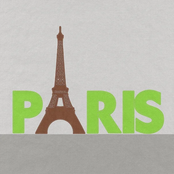 埃菲尔铁塔，巴黎。法国在绣风格的织物背景 — 图库照片