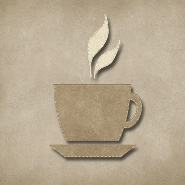 Kaffee mit Stich Stil auf Lederhintergrund — Stockfoto