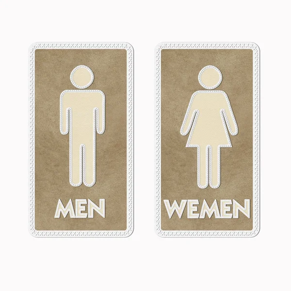 Stitched Man & Woman restroom sign on leather background — Stock Photo, Image
