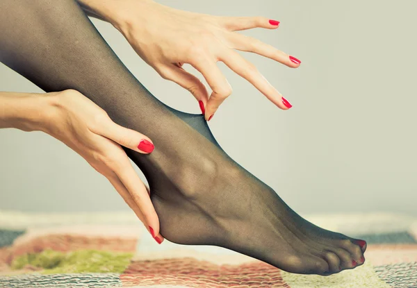 Sexy feet in stockings — Stock Photo, Image