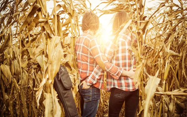 Young couple at dry corn — Stock Photo, Image