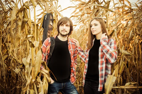 Young couple at dry corn — Stock Photo, Image