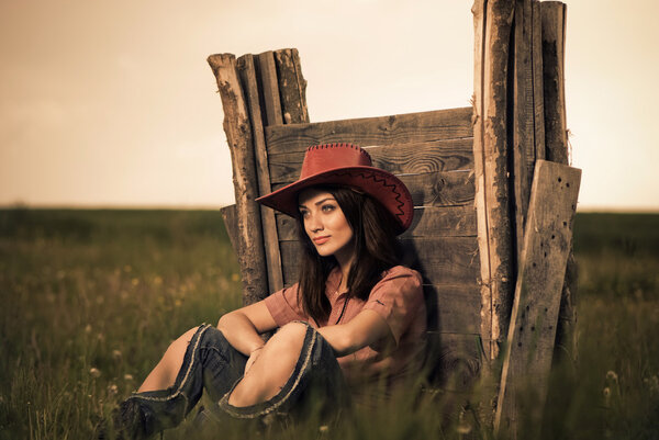 Young woman portrait in a hat