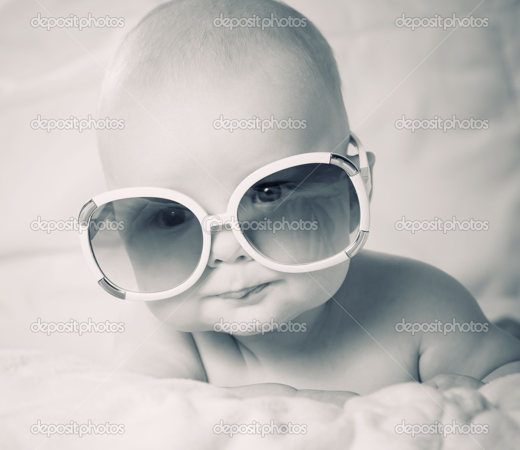 Funny baby in sunglasses