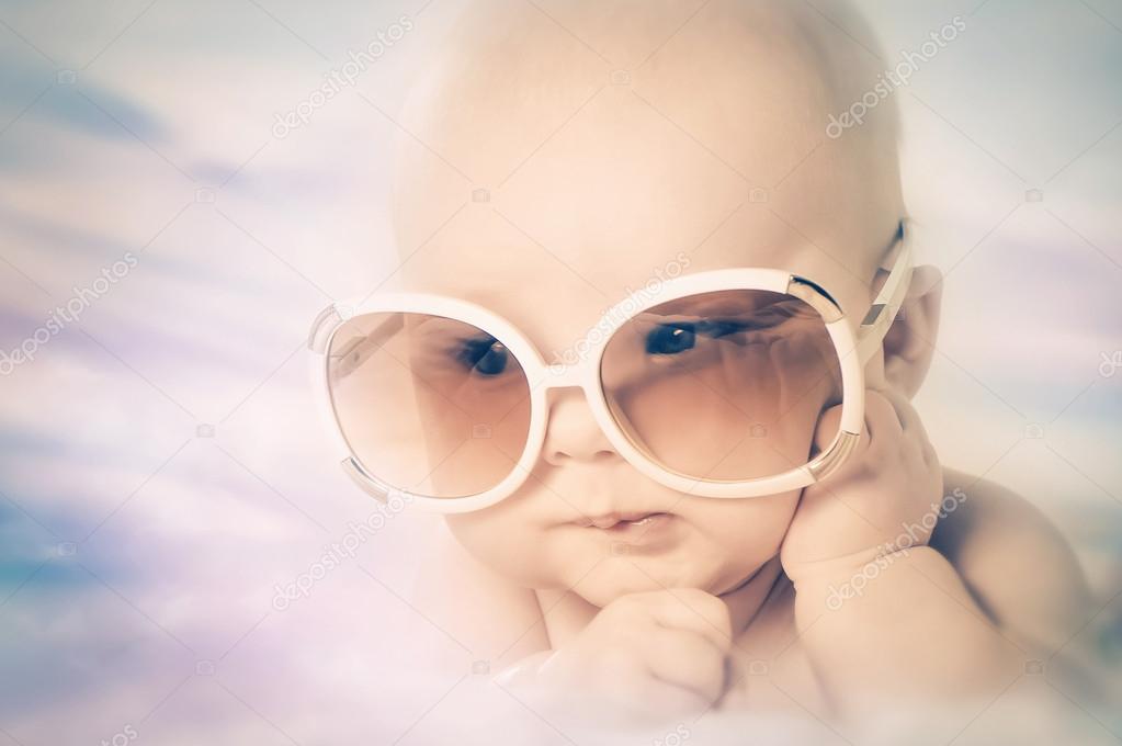 Funny baby in sunglasses