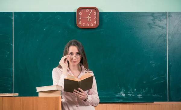 Teacher with book — Stock Photo, Image