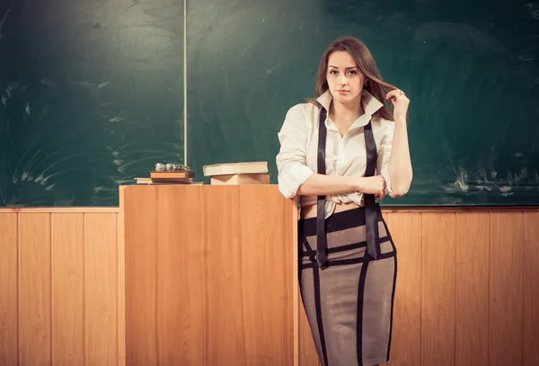 Sexy teacher at classroom — Stock Photo, Image