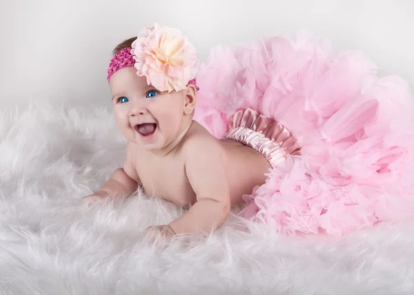 Happy child of the fluffy skirt — Stock Photo, Image