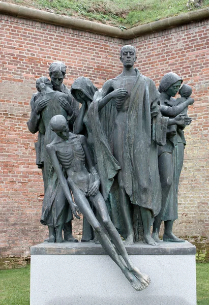 Ett monument som representerar död och svält Stockbild