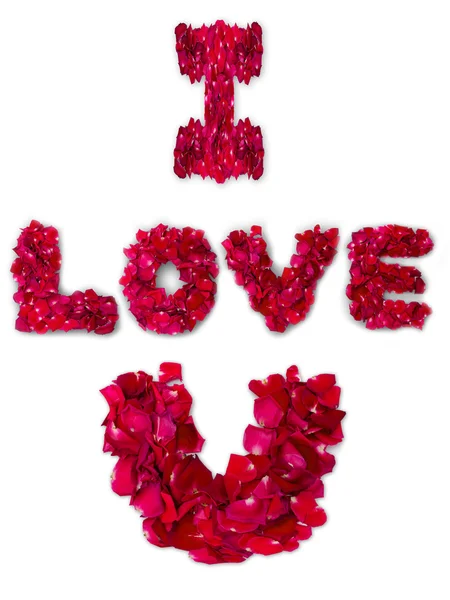 Word of love made from red rose petals isolated on white — Stock Photo, Image