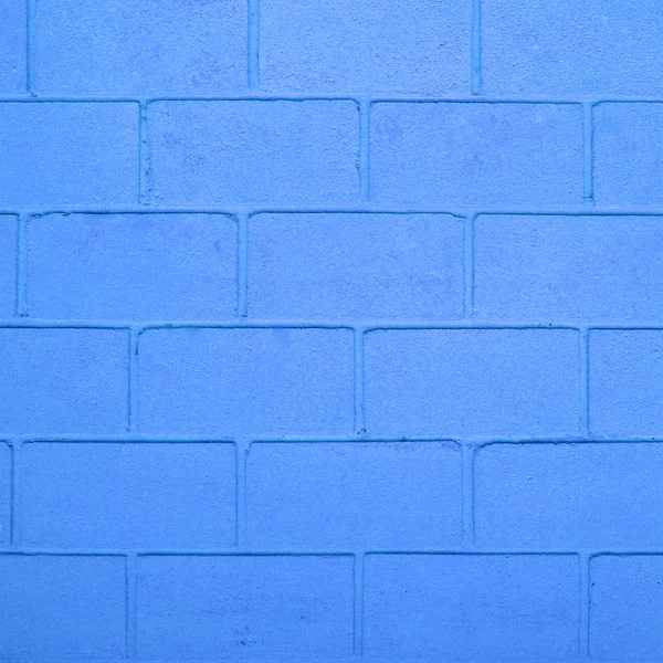 Blauwe kleur bakstenen muur — Stockfoto