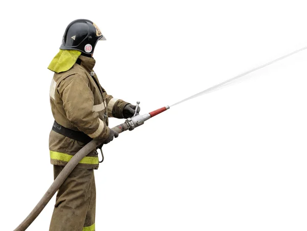 Brandweerman werken met mist sproeier Rechtenvrije Stockafbeeldingen