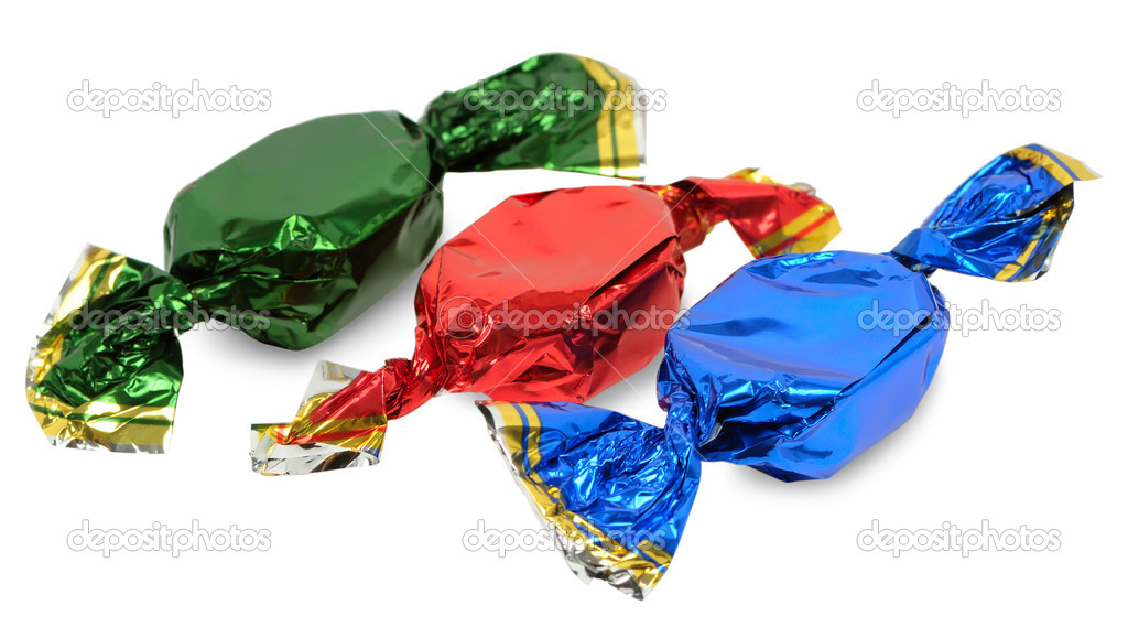 Three candy on white background