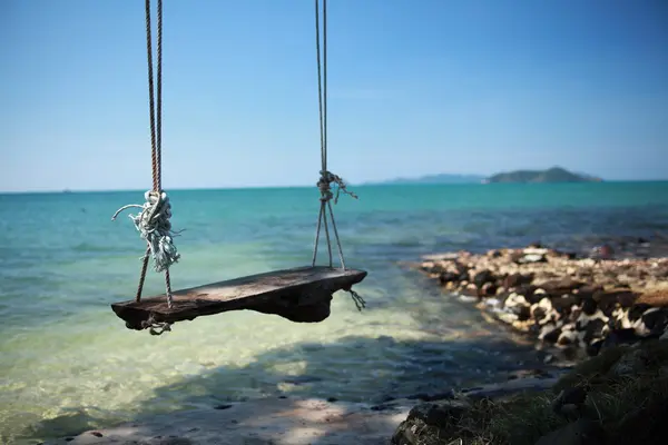 Swing on the sea bay — Stock Photo, Image