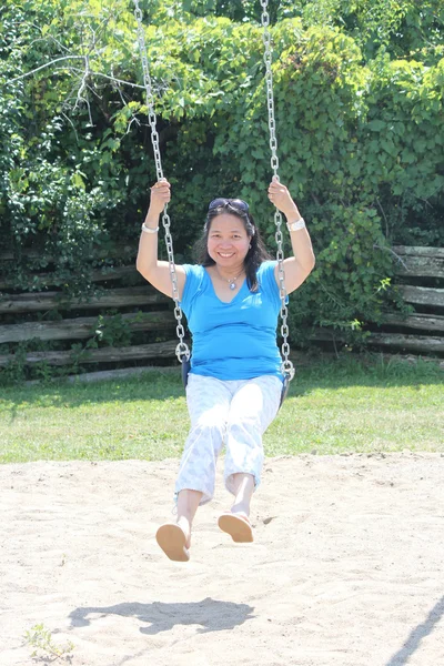 Woman on Swing — Stock Photo, Image