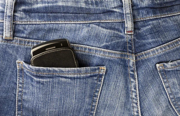 Cellphone en jeans — Stockfoto