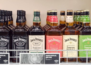 Helsinki, Finland - 09 August 2022: Selection of bottles of Jack Daniels whiskey on alcohol shop shelf