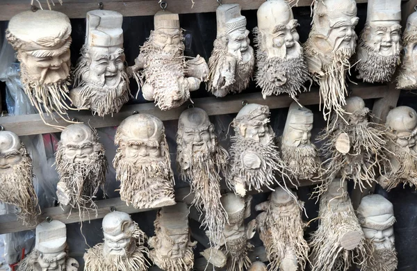 Bamboo Root Carvings of Happy Old Men. — Stock Photo, Image