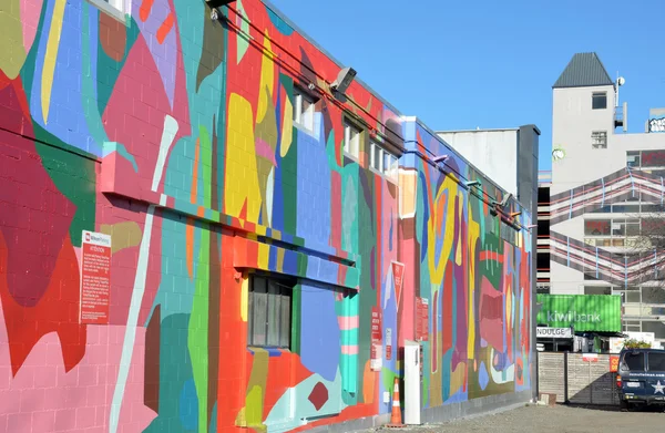 Christchurch aardbeving herbouwen - kloof vuller muur kunst. — Stockfoto