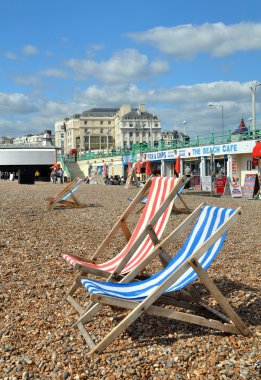 Brighton England - Deck chairs on Brighton Beach. clipart