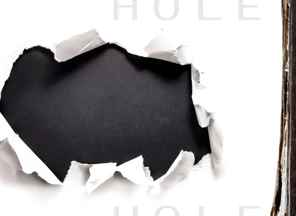 Breakthrough paper hole Stock Photo by ©Fotana 5964156