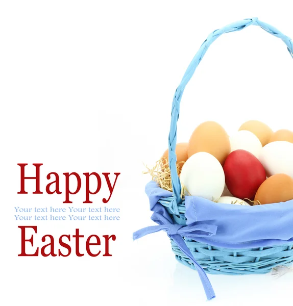 Red Easter egg among fresh eggs in the basket — Stock Photo, Image