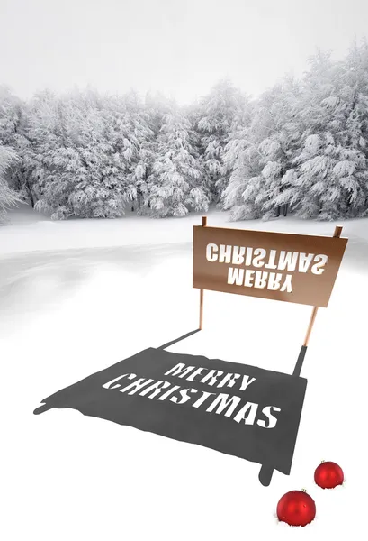 Merry Christmas sign on snowy field — Stock Photo, Image