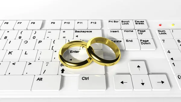 Anneaux de mariage au clavier — Photo