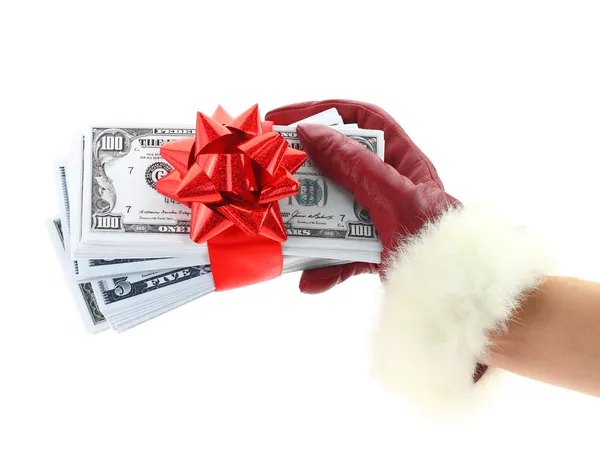 Woman's hand with red glove holding gift of money — Stock Photo, Image