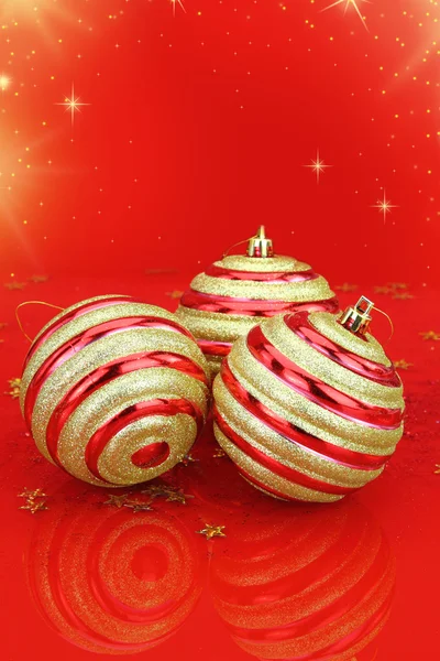 Christmas balls on red background — Stock Photo, Image