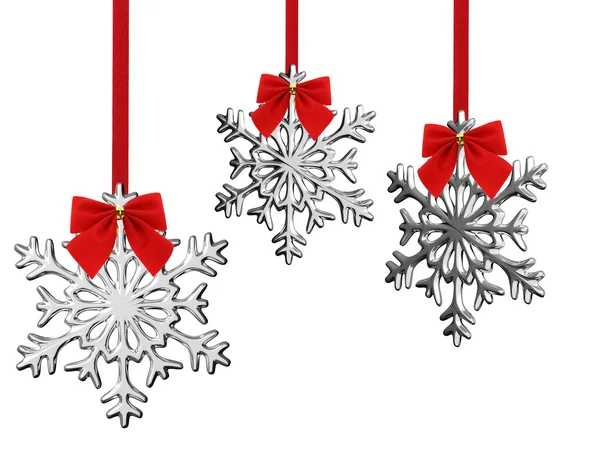Christmas snowflakes hanging on a bow — Stock Photo, Image