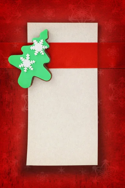 Carte de Noël avec biscuit à l'arbre sur fond de tissu — Photo
