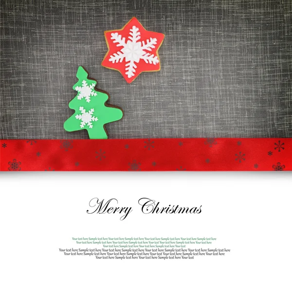 Christmas card with cookies on fabric background — Stock Photo, Image