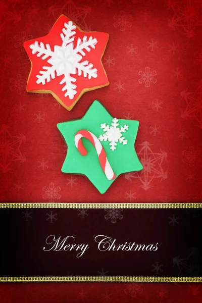 Christmas card with star cookies on red background — Stock Photo, Image