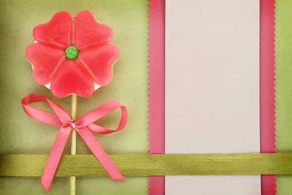 Tarjeta de felicitación flor-corazón piruleta y papel — Foto de Stock