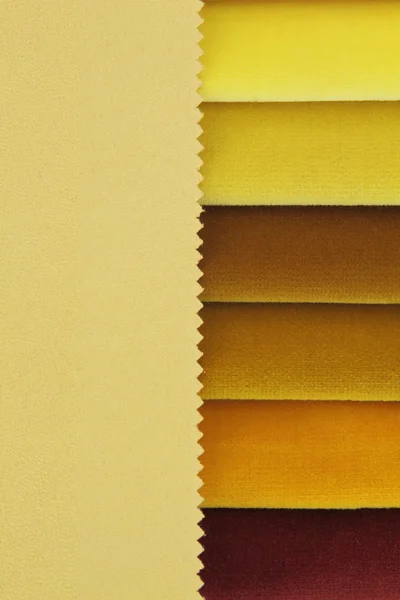 Color background of yellow fabric samples — Stock Photo, Image